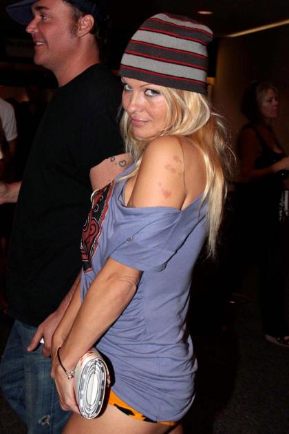 Pamela Anderson wears printed undies and t-shirt to art opening
