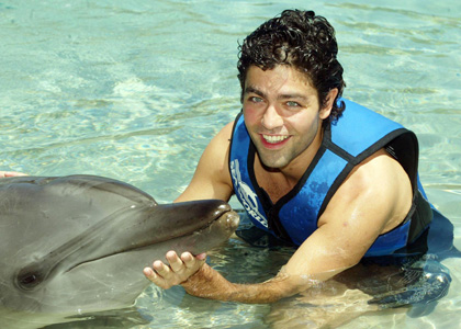 Adrian Grenier Swims with the Dolphins