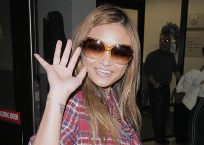Tila Tequila Lands at LAX, Talks Nude Tanning