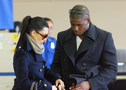Kim Kardashian and Reggie Bush Take Flight