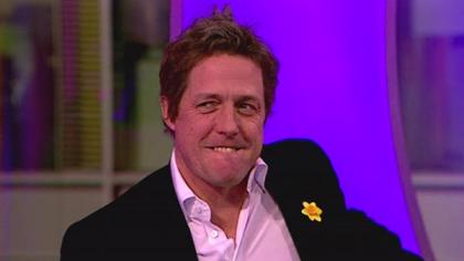 Hugh Grant makes out with two women at NY Bar