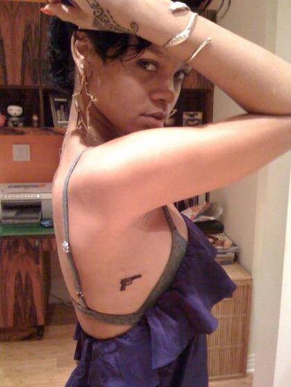 Rihanna gets a tiny gun tattoo