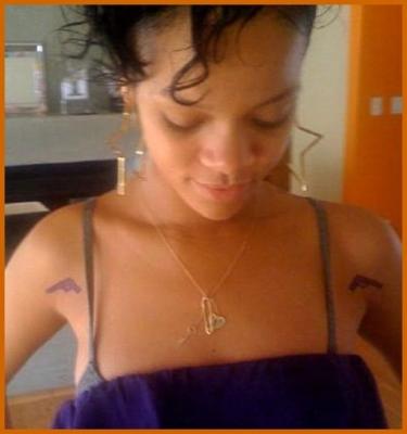 Rihanna Gets A Gun Tattoo