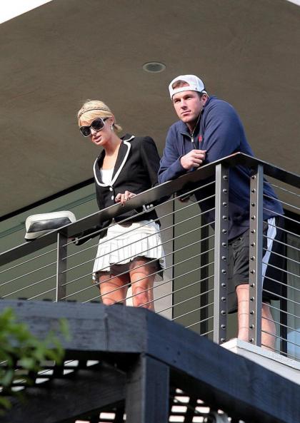 Paris Hilton and Doug Reinhardt look at homes together, still look bored