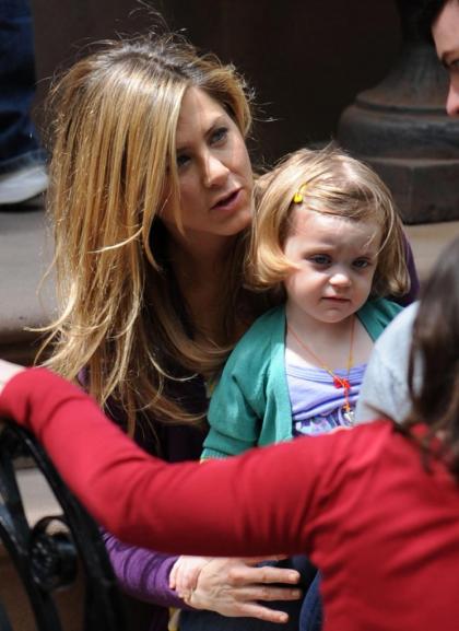 Jennifer Aniston with her cute co-star on set