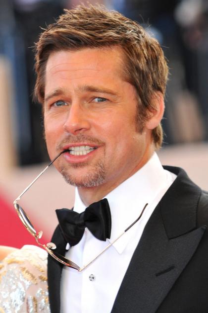 Brad Pitt uses baby wipes on his pits because he gets 'pissed on all day'