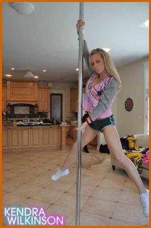 Kendra Wilkinson Puts Her Stripper Pole To Good Use
