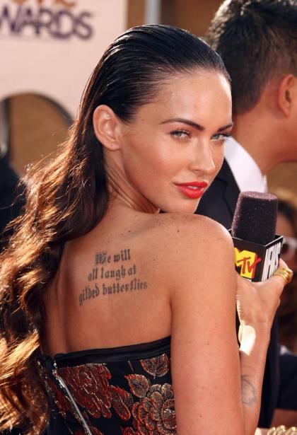 Megan Fox fighting with mom over plans to get tattoo sleeve, cites Angelina