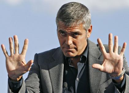George Clooney sues paparazzi for pics of 13 yo girl topless inside his home