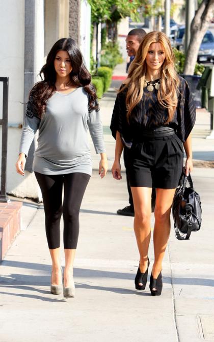 Kim Kardashian Shops with Kourtney, Lines Up New Scent