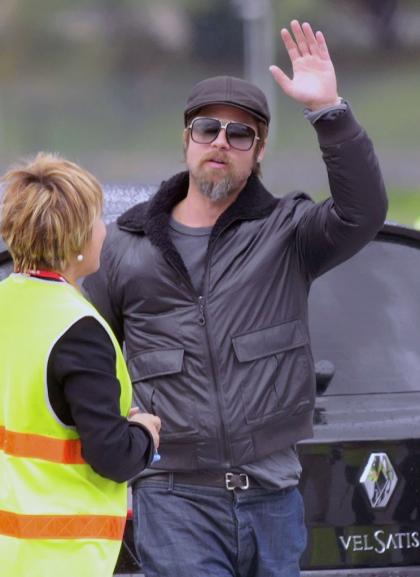 Brad Pitt shows off his scruffy goatee while Angelina wastes away