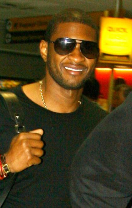 Usher Puts the Brakes on Divorce