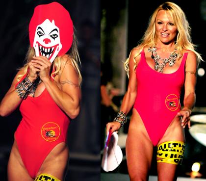 Pamela Anderson wears her stretched out Baywatch swimsuit on the catwalk
