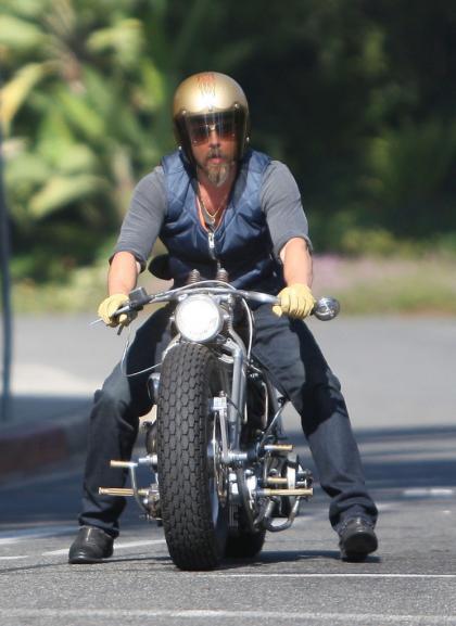 Brad Pitt gets into a weird motorcycle accident