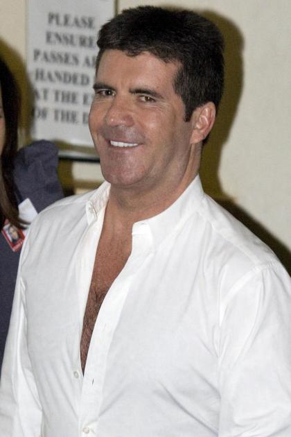 Simon Cowell wears hilarious shirts, waxes his hands