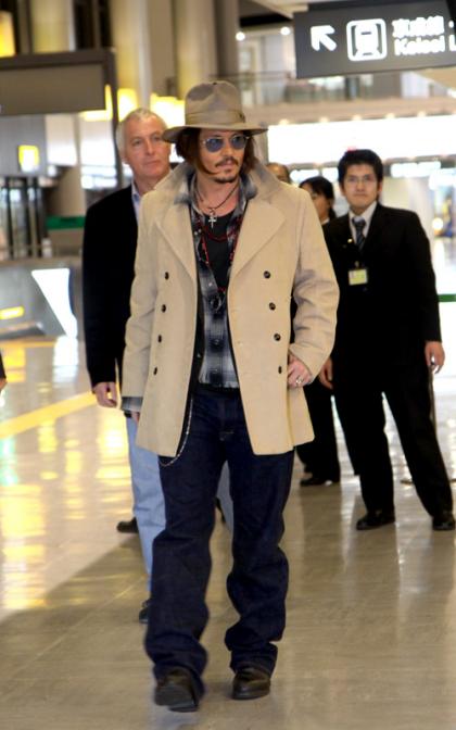 Johnny Depp Touches Down in Tokyo