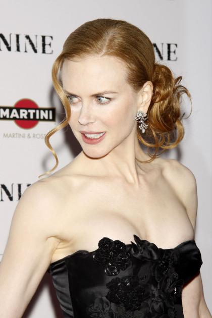 Nicole Kidman nearly busts out of her dress at 'Nine' premiere