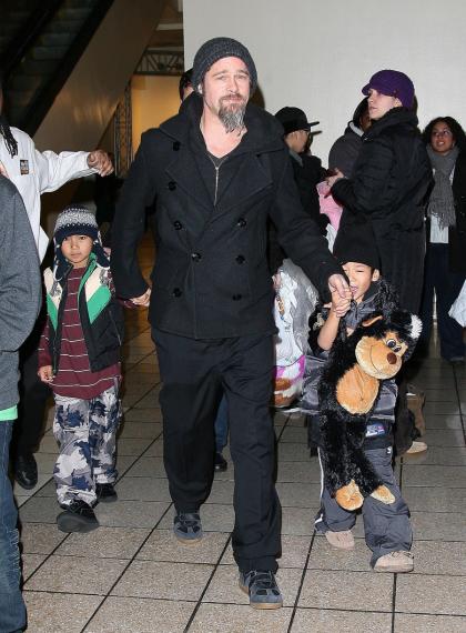 Brad Pitt takes Pax  Maddox to Dave  Busters