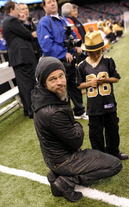 Brad Pitt and Maddox Cheer Saints to Victory