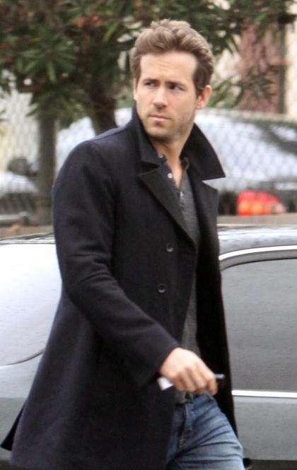 Ryan Reynolds walks around like he's posing for a magazine