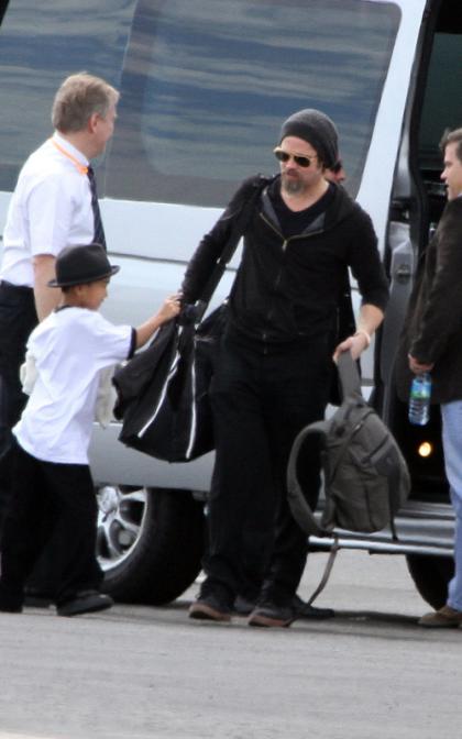 Brad Pitt and Maddox Jet Out of Miami