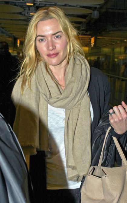 Kate Winslet Touches Down at Heathrow