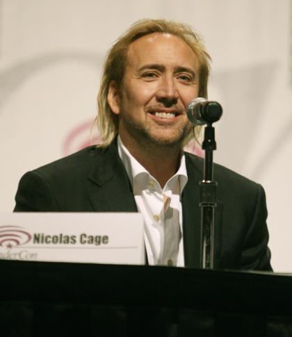 What is going on with Nicolas Cage's hair (plugs)'