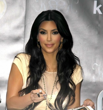 Kim Kardashian sprays Windex on her food so she won't eat it