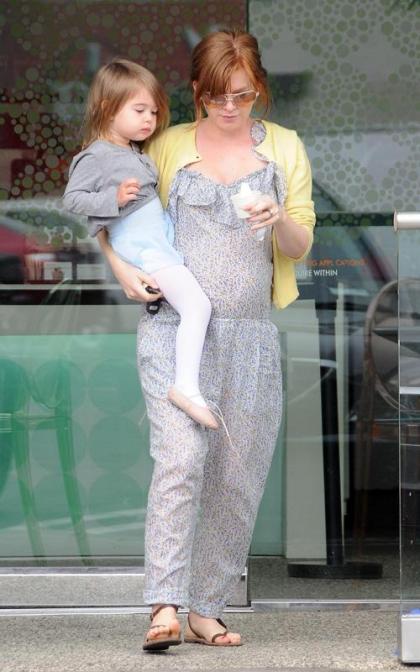 Isla Fisher Bumps Around Town with Olive