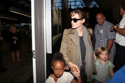 Angelina Jolie brings Shiloh (in combat boots)  Zahara to LAX