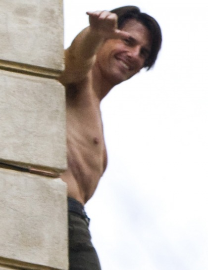 Tom Cruise is shirtless again, still oddly lumpy & strange
