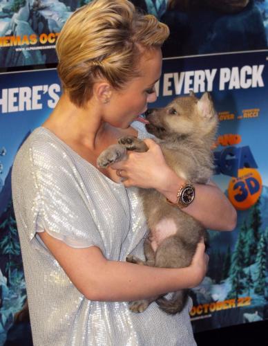 Hayden Panettiere Gives A Dog A Bone