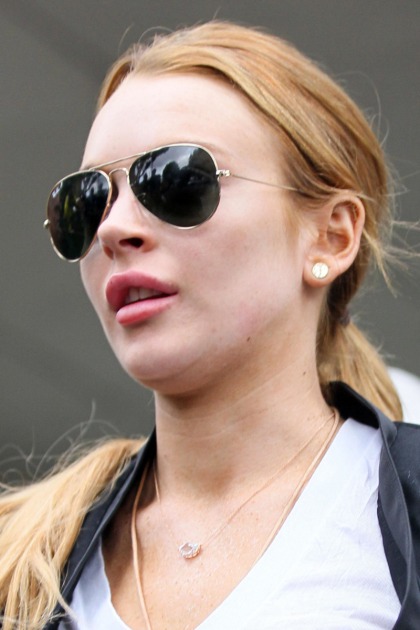 Lindsay Lohan is still a crack liar and a hustler, shockingly