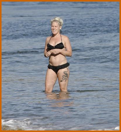 Pregnant Pink Steps Out in a Bikini!