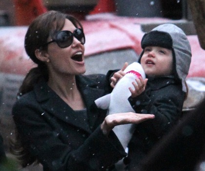 Angelina Jolie takes out one of the twins: Vivienne or Knox (or Fax)?