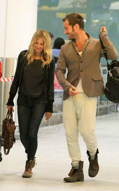 Jude Law & Sienna Miller's Heathrow Landing