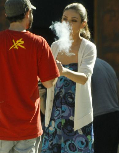Mila Kunis Is Smoking