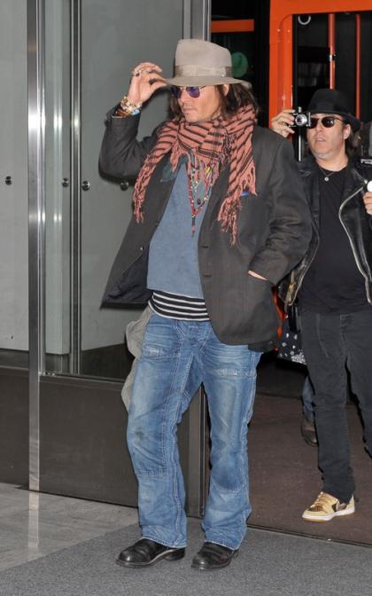Johnny Depp Touches Down in Japan