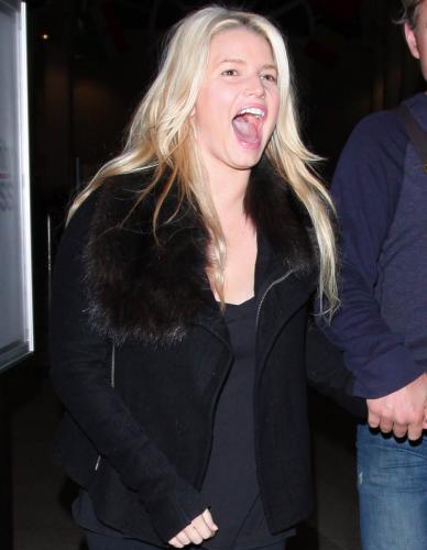 Jessica Simpson Flashes Her Breasts Tonsils?