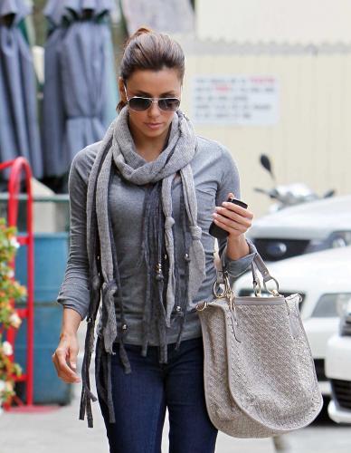 Eva Longoria Flashes A Tight Denim Booty