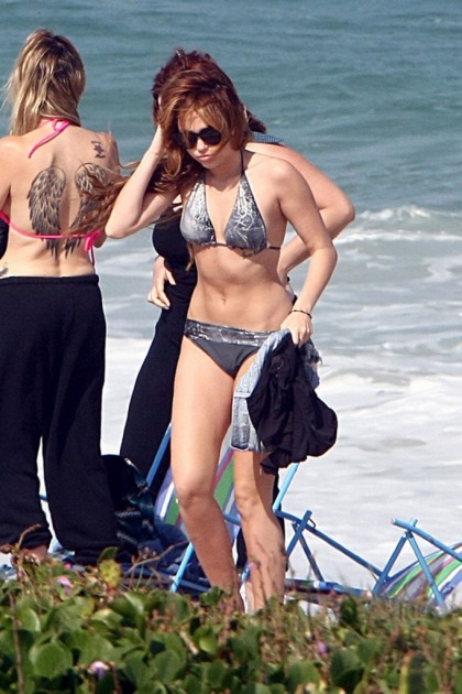 Miley Cyrus in a bikini & her mom's giant back tattoo: cool or regrettable'