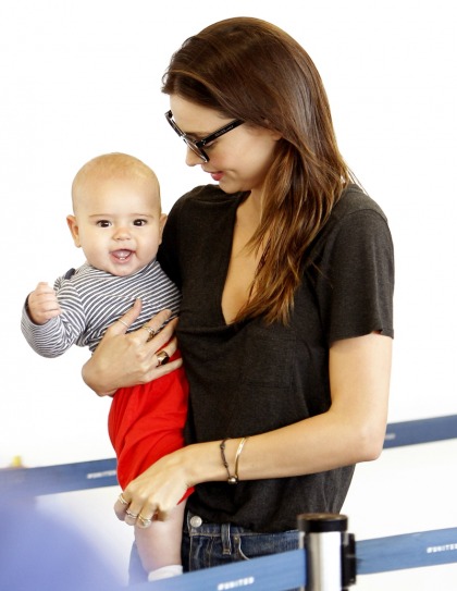 Miranda Kerr shows off 6-month-old baby Flynn, who is chubby & adorable