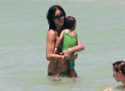Adriana Lima in a Bikini' with Her Baby