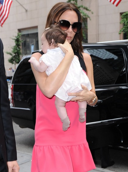 Victoria Beckham takes baby Harper to NY Fashion Week, in stilettos