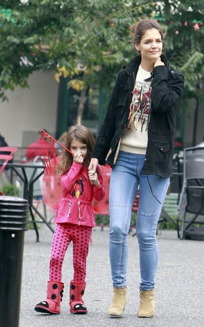 Katie Holmes Steps Out with Her Little Ladybug