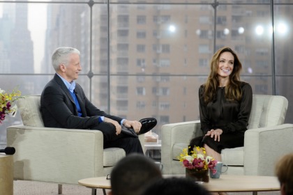 Angelina Jolie mystified by the tabloid obsession with   her life: 'I?m the most boring!'