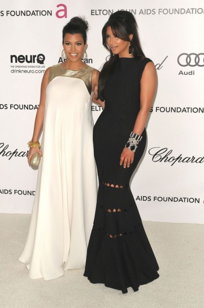 Kim & Kourtney Kardashian at an Oscar Party: what's white, black and orange all over'