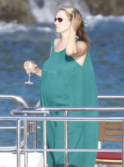 Uma Thurman drinks wine, shows off her big baby bump in St. Bart's