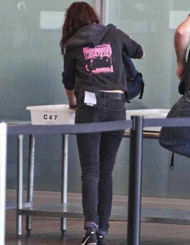 Kristen Stewart's Airport Strip Show