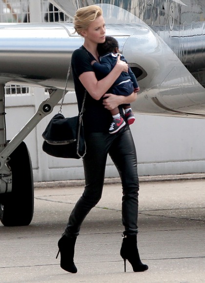 Charlize Theron refuses to give up her leather pants & stilettos for baby Jackson